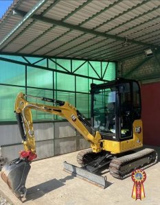 Мини-экскаватор Cat302